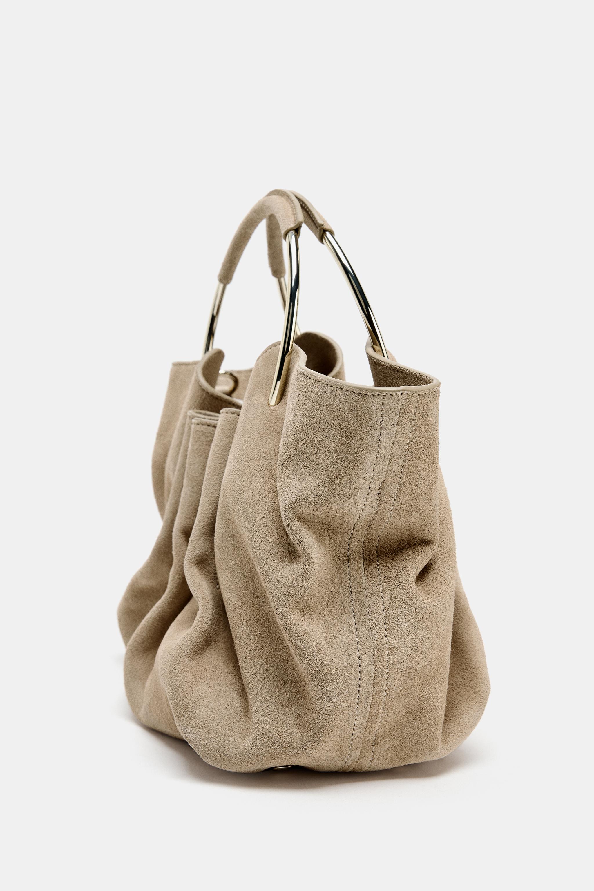 RIGID HANDLE SPLIT LEATHER BUCKET BAG